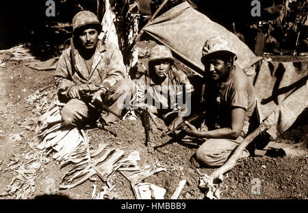 Navajo Indian communication men with the Marines on Saipan landed with the first assault waves to hit the beach. Ca. June 1944. J. L. Burns (Marine Corps) Exact Date Shot Unknown NARA FILE #:  127-N-82619 WAR & CONFLICT BOOK #:  1193 Stock Photo