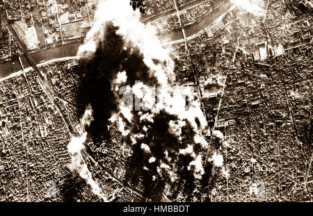 Photograph made from B-17 Flying Fortress of the 8th AAF Bomber Command on 31 Dec. when they attacked the vital CAM ball-bearing plant and the nearby Hispano Suiza aircraft engine repair depot in Paris, France.  1943.  Army Air Forces.  (OWI) NARA FILE #:  208-EX-249A-27 WAR & CONFLICT BOOK #:  1322 Stock Photo