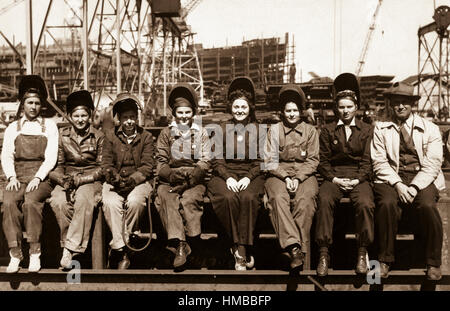 Line up of some of women welders including the women's welding champion of Ingalls.  Ingalls Shipbuilding Corp., Pascagoula, MS, 1943.  Spencer Beebe.  (Women's Bureau) Exact Date Shot Unknown NARA FILE #:  086-WWT-85-35 WAR & CONFLICT BOOK #:  809 Stock Photo