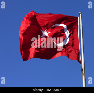 Turkish flag waving in wind at sun day Stock Photo