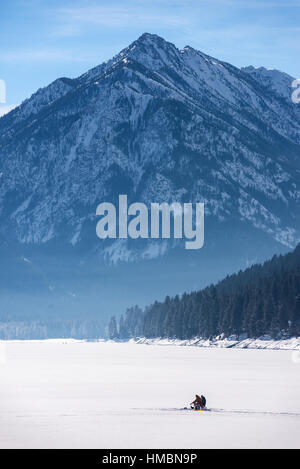 Ice fishing on Wallowa Lake, Oregon. Stock Photo