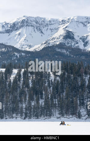 Ice fishing on Wallowa Lake, Oregon. Stock Photo