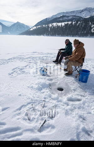 Ice fishing on Wallowa Lake, Oregon. Stock Photo