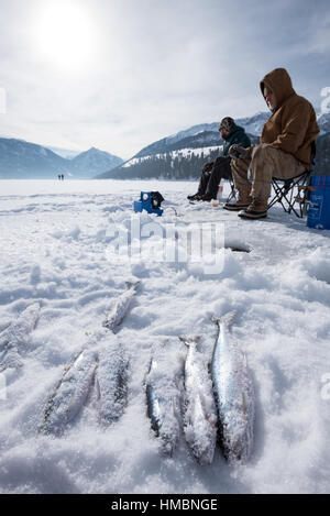 Ice fishing on Wallowa Lake, Oregon. Stock Photo