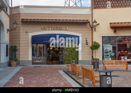 MUGELLO, ITALY - SEPTEMBER 11, 2014: Facade of Gutteridge store in McArthurGlen Designer Outlet Barberino situated in 30 minutes from Florence. McArth Stock Photo