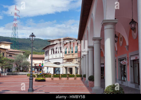 MUGELLO, ITALY - SEPTEMBER 11, 2014: Store facedes of McArthurGlen Designer Outlet Barberino situated in 30 minutes from Florence. McArthurGlen Group  Stock Photo