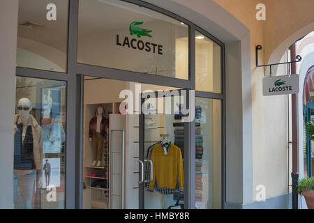 MUGELLO, ITALY - SEPTEMBER 11, 2014: Facade of Lacoste store in McArthurGlen Designer Outlet Barberino situated close to Florence. Lacoste is a French Stock Photo