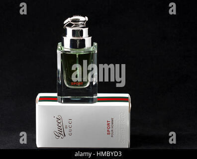 KIEV, UKRAINE - OCTOBER 23, 2011: Sport eau de toilette by Gicci against black. Gucci is an Italian fashion and leather goods label, part of the Gucci Stock Photo