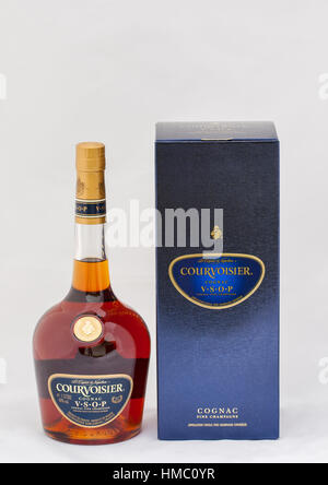 KIEV, UKRAINE - MAY 06, 2012: Courvoisier V.S.O.P. (very special or superior old pale) Cognac Fine Champagne bootle and box against white background.  Stock Photo