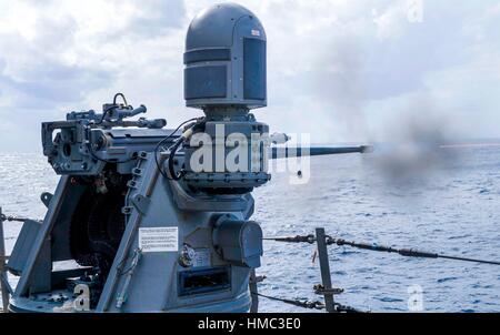 Guided-missile destroyer USS John S. McCain (DDG 56) moored pier