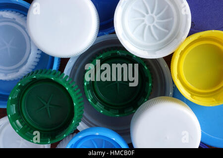 Lids from plastic bottles.  Recycled concept. Stock Photo