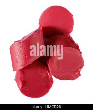 A cut out beauty image of a sample of chopped red lipstick Stock Photo