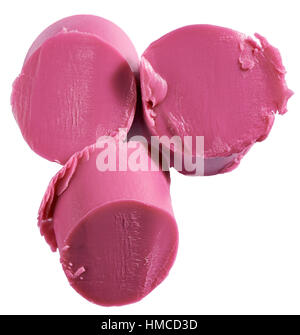 A cut out beauty image of a sample of chopped pink lipstick Stock Photo