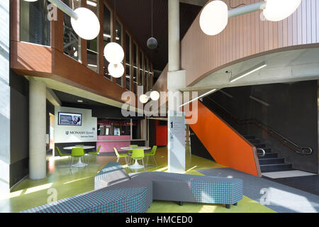 Entrance foyer with reception desk in background & gymnasium volume upstairs (left). MPARC (Monash Peninsula Activity and Recreation Centre), Franksto Stock Photo