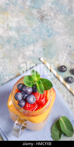 Mango drink and blueberries above Stock Photo
