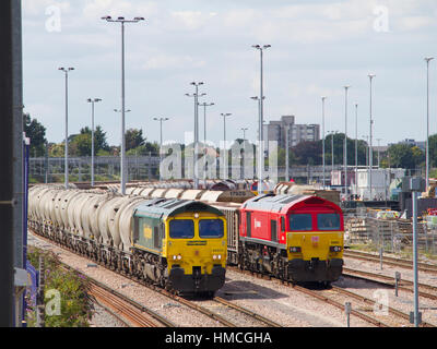 A Freightliner class 66 locomotive and a DB Schenker class 59 locomotive side by side in Acton yard, West London 17th August 2015. Stock Photo