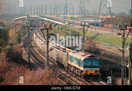 A class 59 diesel locomotive number 59102 working a loaded stone train at Purfleet on the 16th November 2010. Stock Photo