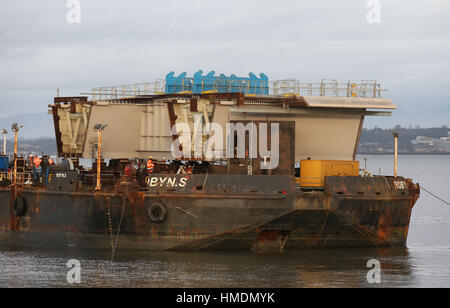 The final deck piece of the Queensferry Crossing over the Firth of Forth, sits on a barge ahead of it being lifted into position. Once the operation to start the lift begins, it will take around four hours to complete. Stock Photo