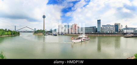 DUSSELDORF, GERMANY - CIRCA SEPTEMBER, 2016: Rhine river boardwalk with view on Dusseldorf city in Germany Stock Photo