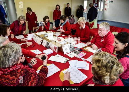 EDITORS NOTE IMAGE PIXELATED BY PA PICTURE DESK Online messages are written into Valentines day cards in the pop-up post office in the village of Lover, New Forest, where residents have launched a Valentine's Day post service, allowing romantics around the world to send a card from the Wiltshire village. Stock Photo