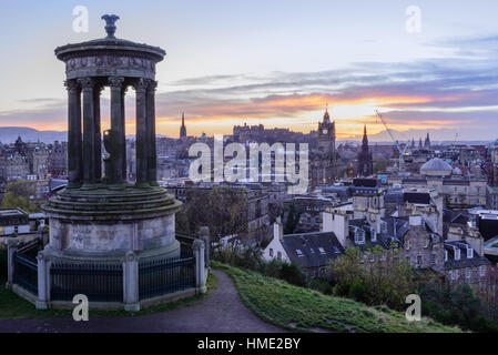 Edinburgh skyline with the Edinburgh castle in the background viewed from Calton Hill soon after sunset.