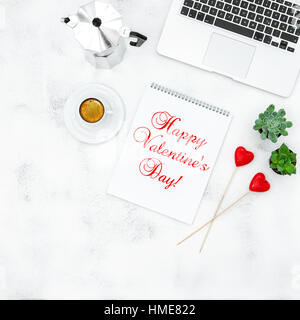 Coffee, keyboard, open book and red hearts. Home office workplace business lady. Flat lay for social media blog Stock Photo