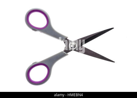 Office or sewing scissors utensil isolated on white background. Used home or office utensil tool for cutting different materials. Stock Photo