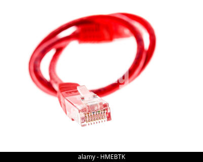 Red network UTP cable with RJ45 connector isolated on white. Telecommunication networking computer connection equipment. Stock Photo