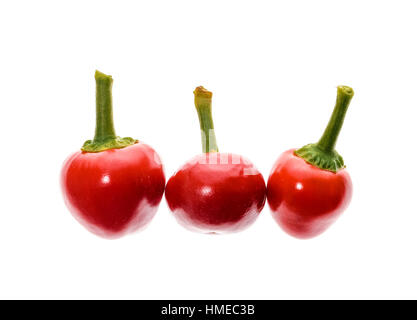 Red hot big cherry peppers chili isolated on white background. Very popular variety of chili for stuffing and pickling. Stock Photo