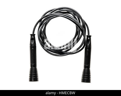 Black jump rope or skipping rope isolated on white background. Sports, fitness, cardio, martial art and boxing accessories. Stock Photo