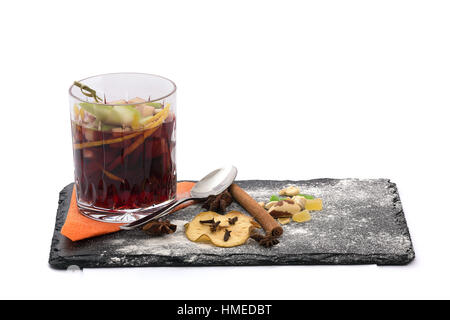 Mulled wine and spices served on mica Stock Photo