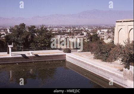 View of the city of Kabul, Afghanistan from the southwest, as seen from atop Kuh-e Sher Darwaza mountain and the historic park of Bagh-e Babur, known as the Gardens of Babur. November, 1973. (Photo by Morse Collection/Gado/Getty Images). Stock Photo