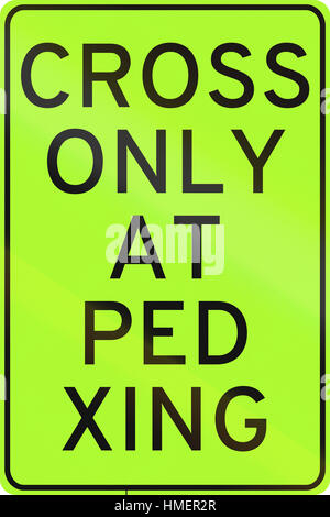 Road sign in the Philippines - Cross only at pedestrian crossing. Stock Photo