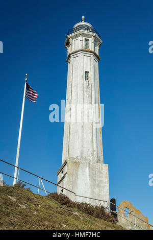 Lighthouse and American flag, Alcatraz Island, San Francisco, California USA Stock Photo