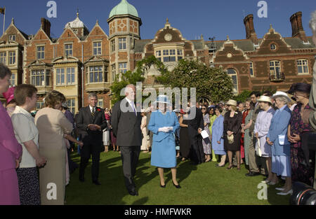 Queen Elizabeth II hosts a Garden Party for East Anglia at Sandringham House in Norfolk. The Queen is accompanied by a personal friend Sir Timothy Colman, owner of Colman's Mustard, which is made locally in Norwich.