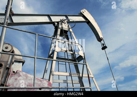 Detail of pump jack in Europe oil field Stock Photo