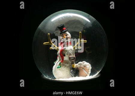 Beautiful Winter Snow Globe With Snowman Inside Stock Photo