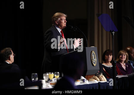 Washington, DC. 2nd Feb, 2017. United States President Donald Trump delivers remarks at the National Prayer Breakfast February 2, 2017 in Washington, DC. Every U.S. president since Dwight Eisenhower has addressed the annual event. Credit: Win McNamee/Pool via CNP - NO WIRE SERVICE - Photo: Win Mcnamee/Consolidated/POOL/dpa/Alamy Live News Stock Photo