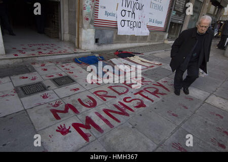 Athens, Greece. 3rd Feb, 2017. Protesters hold banners and shout slogans against closed borders and migration policies. Leftists and human rights activists gathered outside the Ministry of Migration Policy, demonstrating against the current living conditions in refugee camps and the recent deaths at Lesvos and Samos islands. Credit: Nikolas Georgiou/ZUMA Wire/Alamy Live News Stock Photo