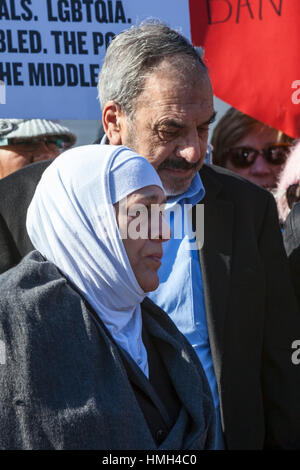 Bloomfield Hills, USA. 3rd February, 2017. Interfaith religious leaders rally during Friday prayers at the Muslim Unity Center in solidarity with the Muslim community and against the Trump administration's immigration/refugee ban. Syrian refugees, whose family was separated by the ban, attended the event. Credit: Jim West/Alamy Live News Stock Photo
