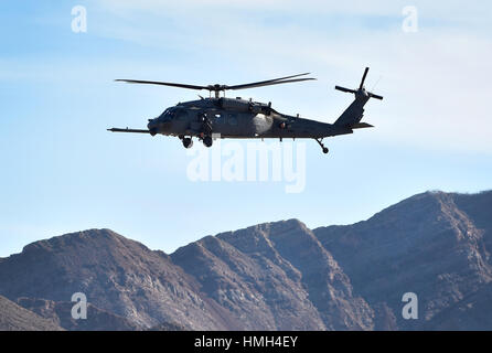 North Las Vegas, Nevada, USA. 25th Jan, 2016. A Sikorsky HH-60 Pave Hawk helicopter flies overhead after taking off during a red flag exercise at Nellis Air Force Base on Monday, Jan. 25, 2016, in North Las Vegas. Credit: David Becker/ZUMA Wire/Alamy Live News Stock Photo