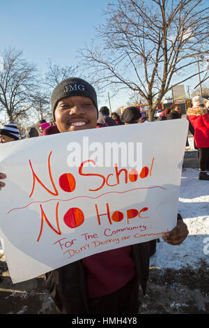 Detroit, USA. 3rd February, 2017. Students from Osborn High School protest against the planned closing of their school, one of 24 the state of Michigan wants to shut in Detroit because of poor academic performance. Detroit teachers have long complained about large class sizes, outdated textbooks, and lack of resources. Credit: Jim West/Alamy Live News Stock Photo