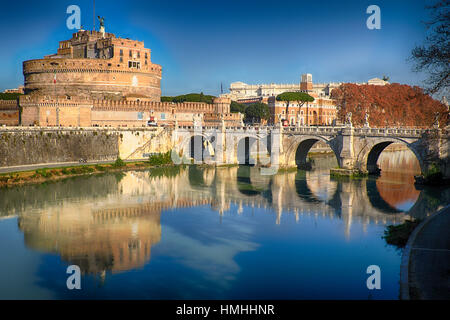 Midday Reflections of the Holy Angel Castle and Bridge in  Tiber River, Rome, Lazio, Italy Stock Photo