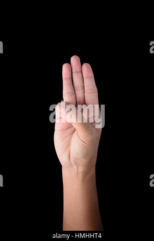 male hand Holds three fingers isolated on black with clipping path Stock Photo