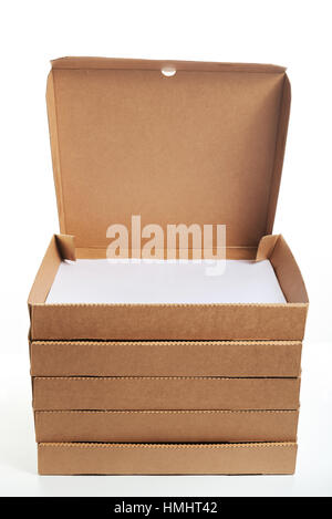 row of brown pizza boxes with open box on top isolated on white Stock Photo