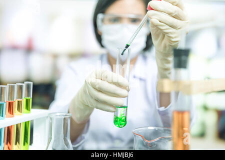 Female scientist researching in laboratory Stock Photo