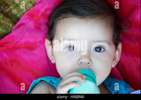small baby drink milk view from top Stock Photo