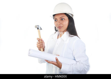 funny latino girl with hammer and plans isolated on white Stock Photo