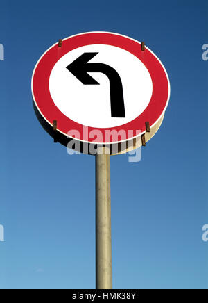 Traffic sign turn to one's left Stock Photo