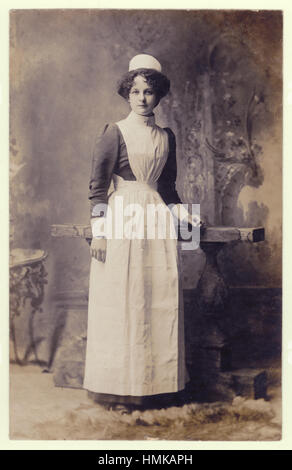 Studio occupational portrait portraits of attractive pretty Edwardian servant housemaid or nursemaid / nurse maid / nanny circa 1905, Wooton, Bedfordshire, England, U.K. Stock Photo